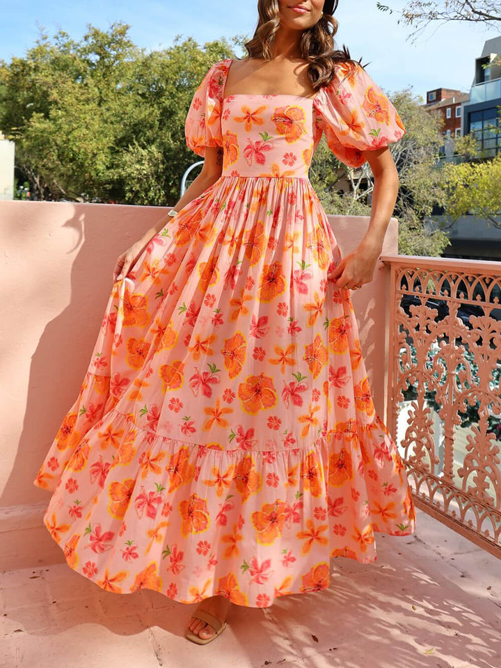 Robe longue à imprimé floral et manches bouffantes au dos avec poche smockée