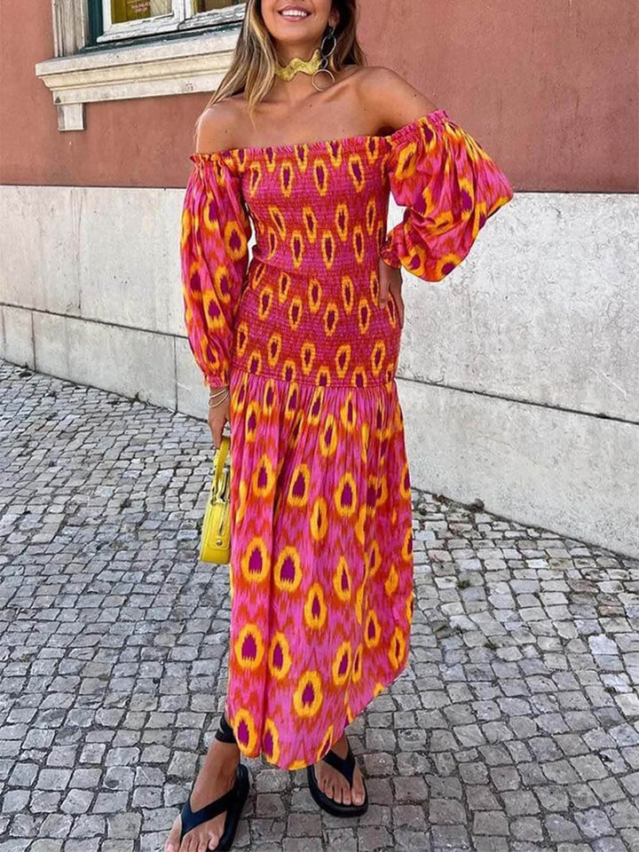 Vestido midi estampado exclusivo com ombro de fora e manga balão