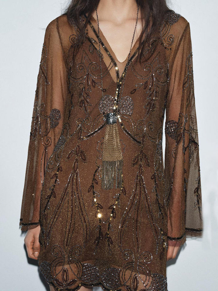 Exquisite Sequin Wavy Hemline Mini Dress