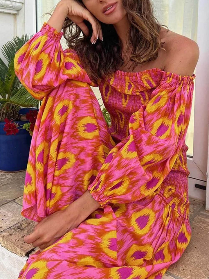 Unieke gesmokte midi-jurk met off-shoulder ballonmouwen en print