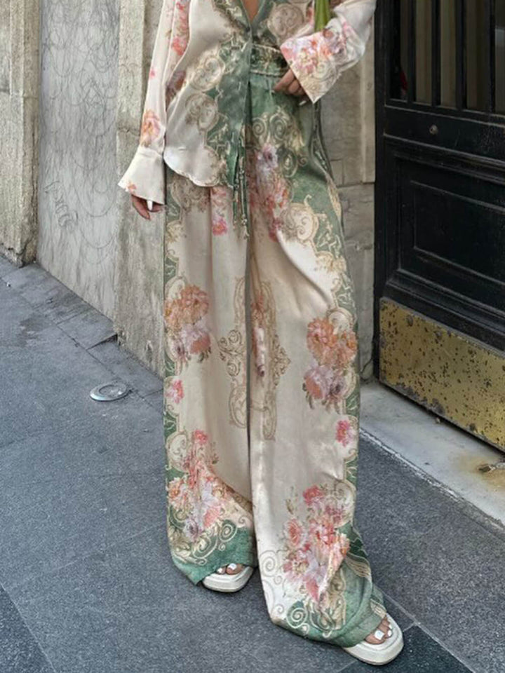 Pantalones anchos con cintura elástica y estampado floral único