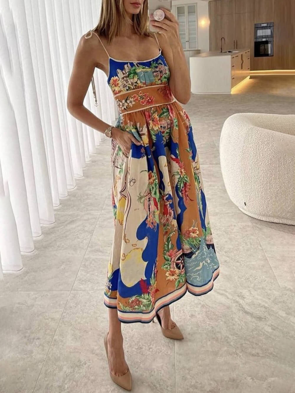 Vestido midi con bolsillos y tirantes con cordones y estampado único