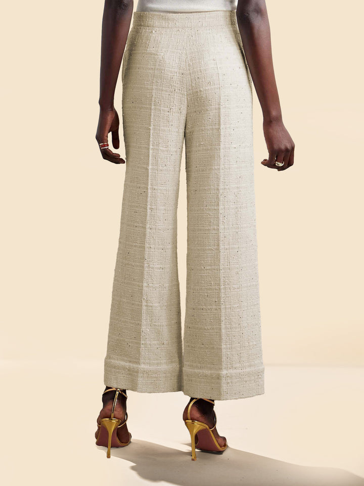 Pantalones elegantes de tweed con bolsillos y pierna ancha