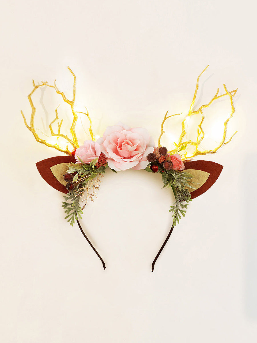 Diadema de reno navideño del bosque rosa