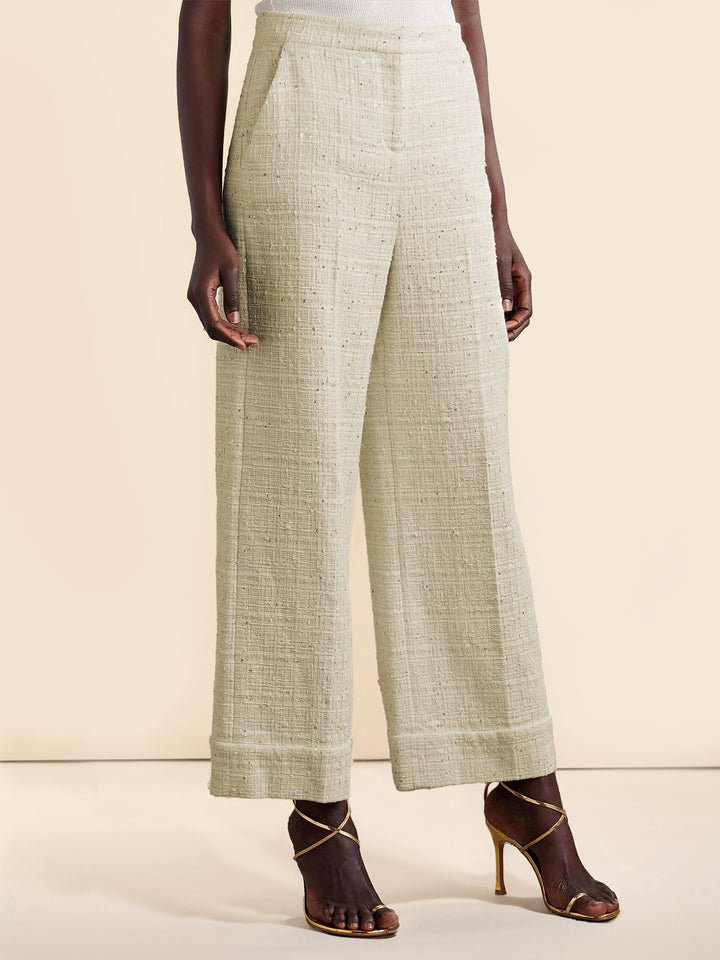 Pantalones elegantes de tweed con bolsillos y pierna ancha