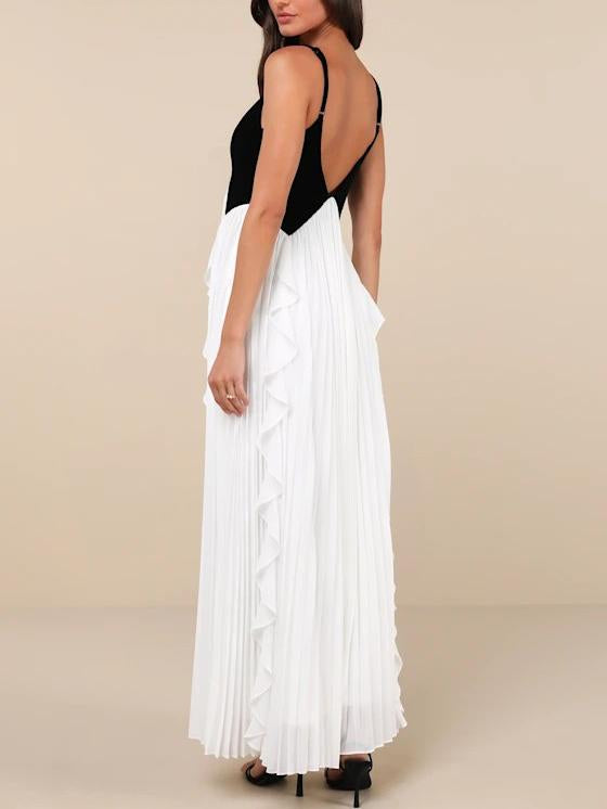 Elegante maxi abito plissettato bianco e nero con scollo a V