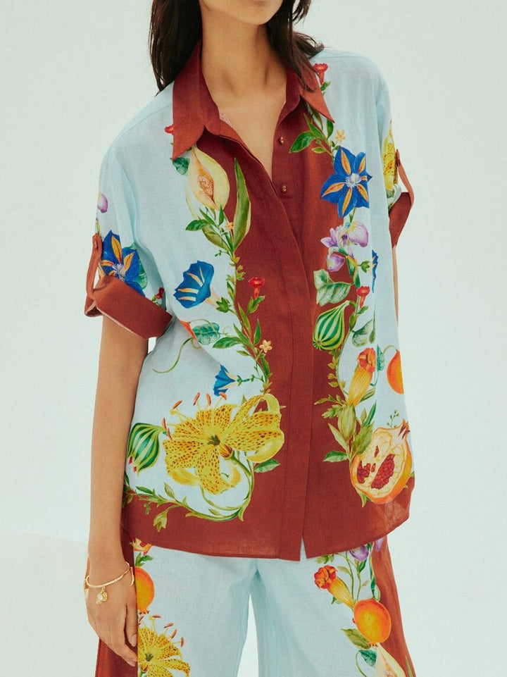 Camicia ampia abbottonata con stampa floreale solare