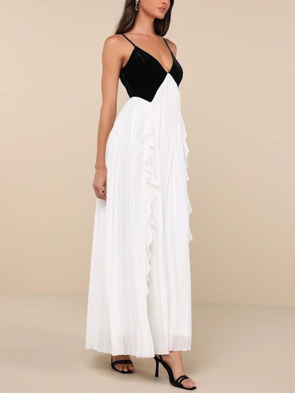 Elegante maxi abito plissettato bianco e nero con scollo a V